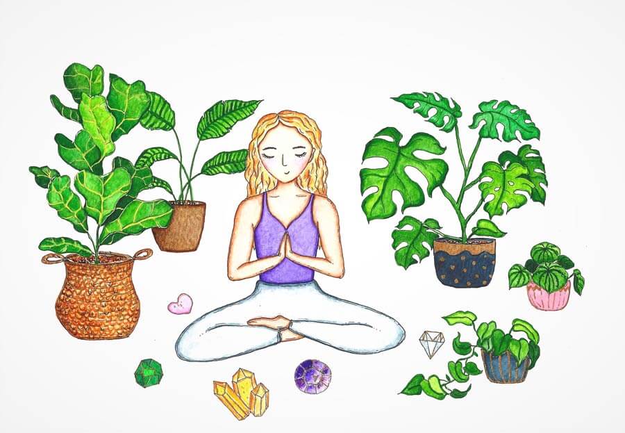 woman meditating with crystals and plants